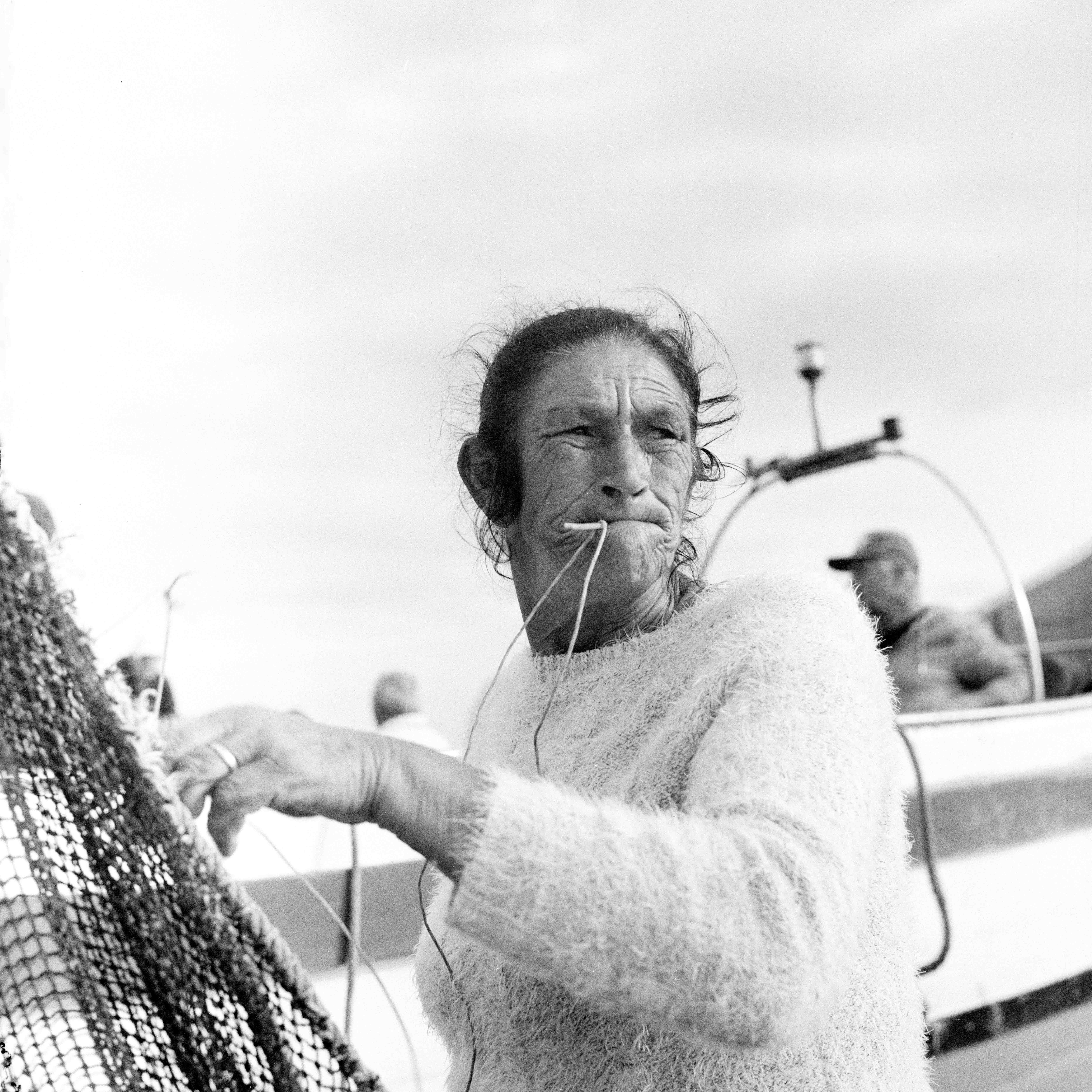 Fisherman with net in hand